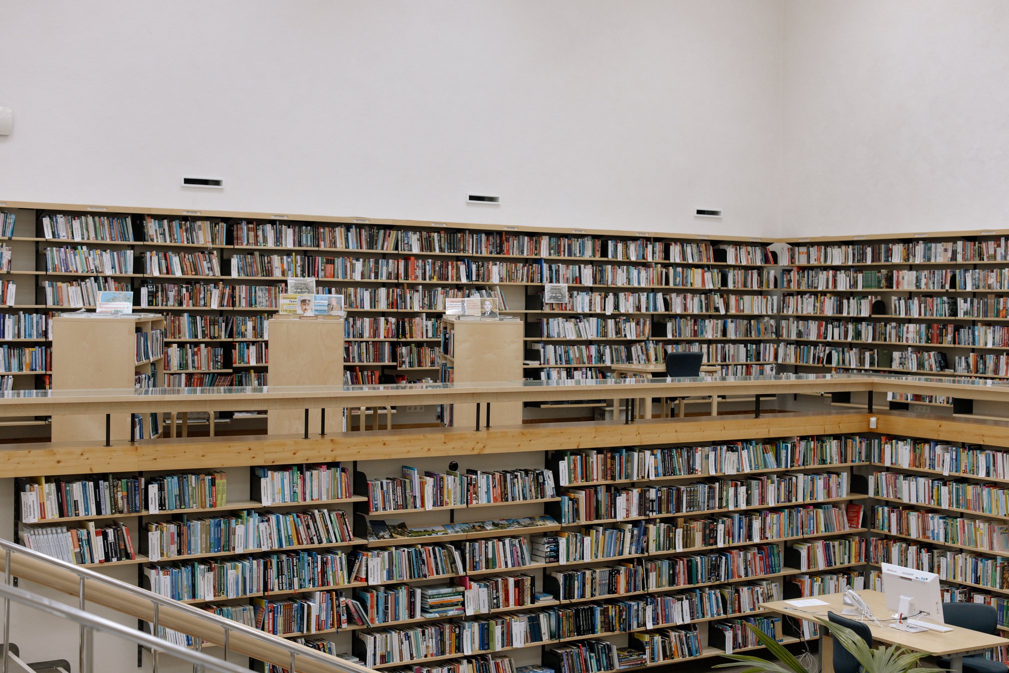 a large library with lots of books on shelves